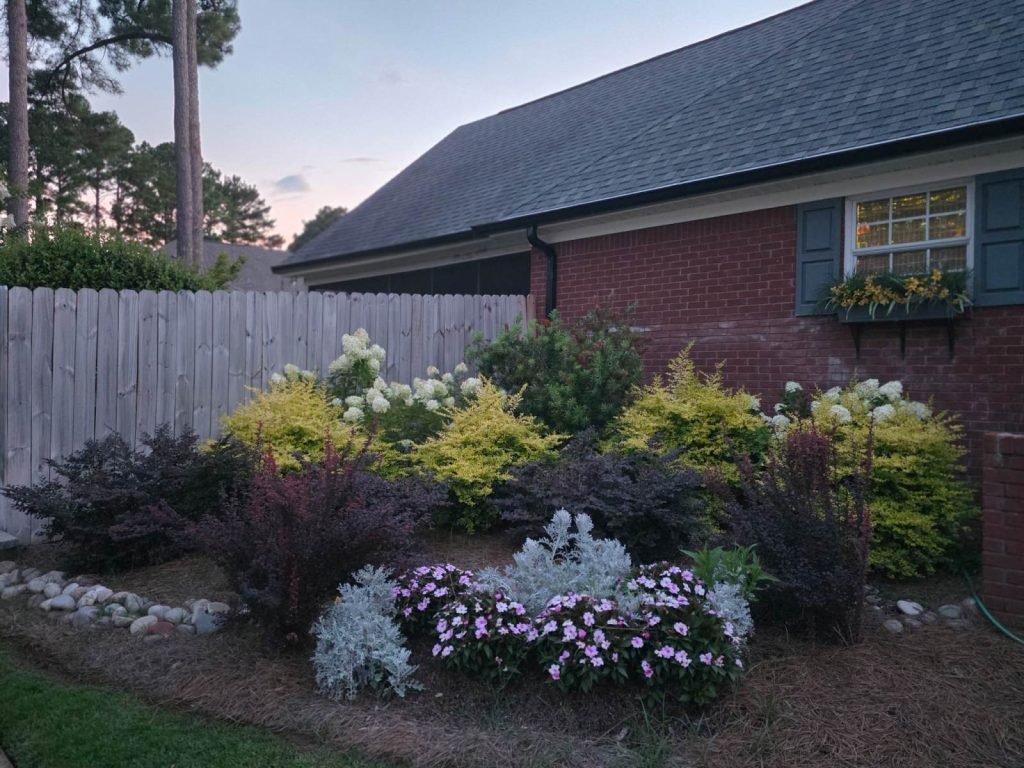 Colorful flower bed and garden planting by Premium Petals in Dothan, AL